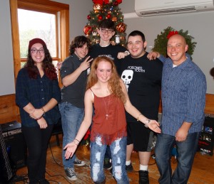 Rock band "Poisoned Youth " features players from Acton, Clinton, Leominster & Lunenburg. (L-R) Jade Mello, Owen Nickerson, Ryan Costa, Brittany Dauphinais, Eric Moreira (with mentor, John Nickerson)